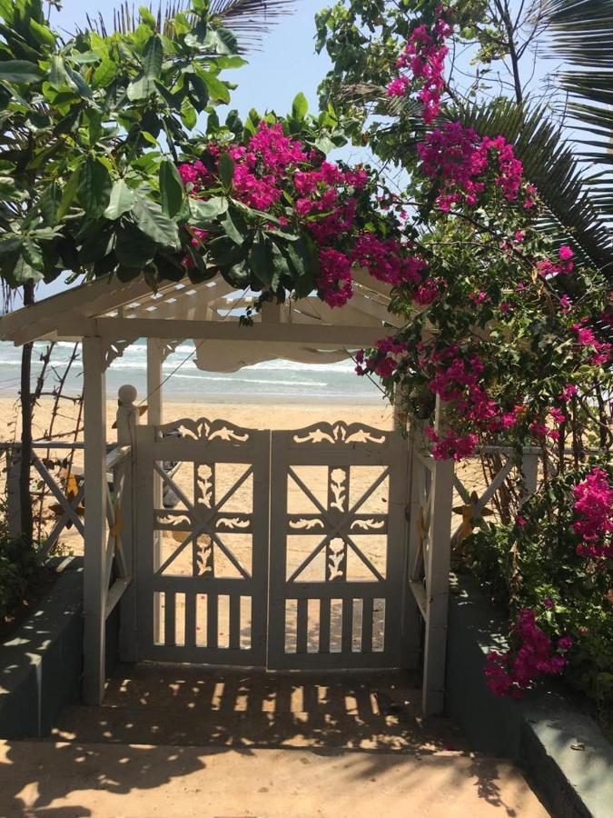 Pele'S Windsong Wood Cottage On The Beach Бенаулим Экстерьер фото