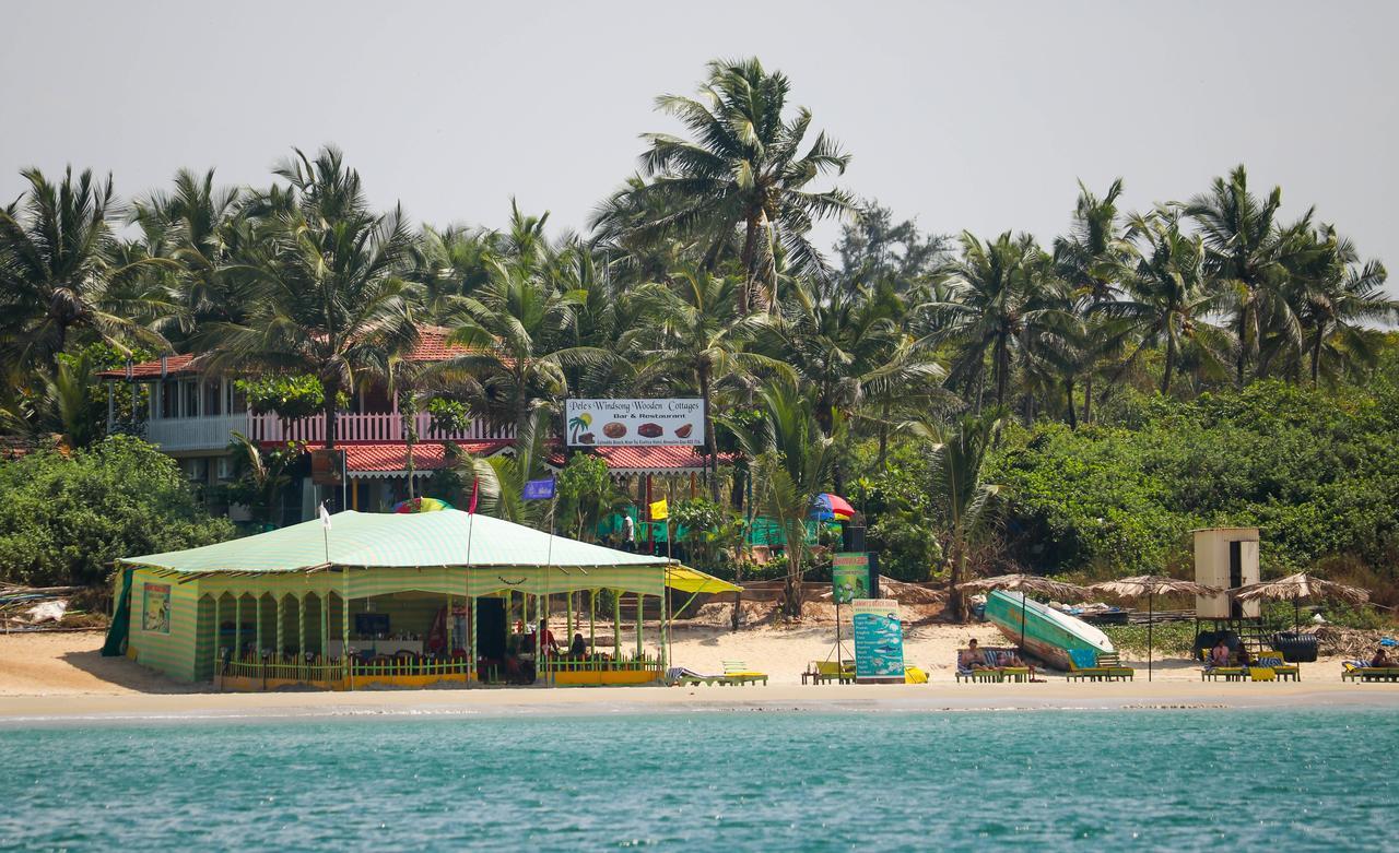 Pele'S Windsong Wood Cottage On The Beach Бенаулим Экстерьер фото